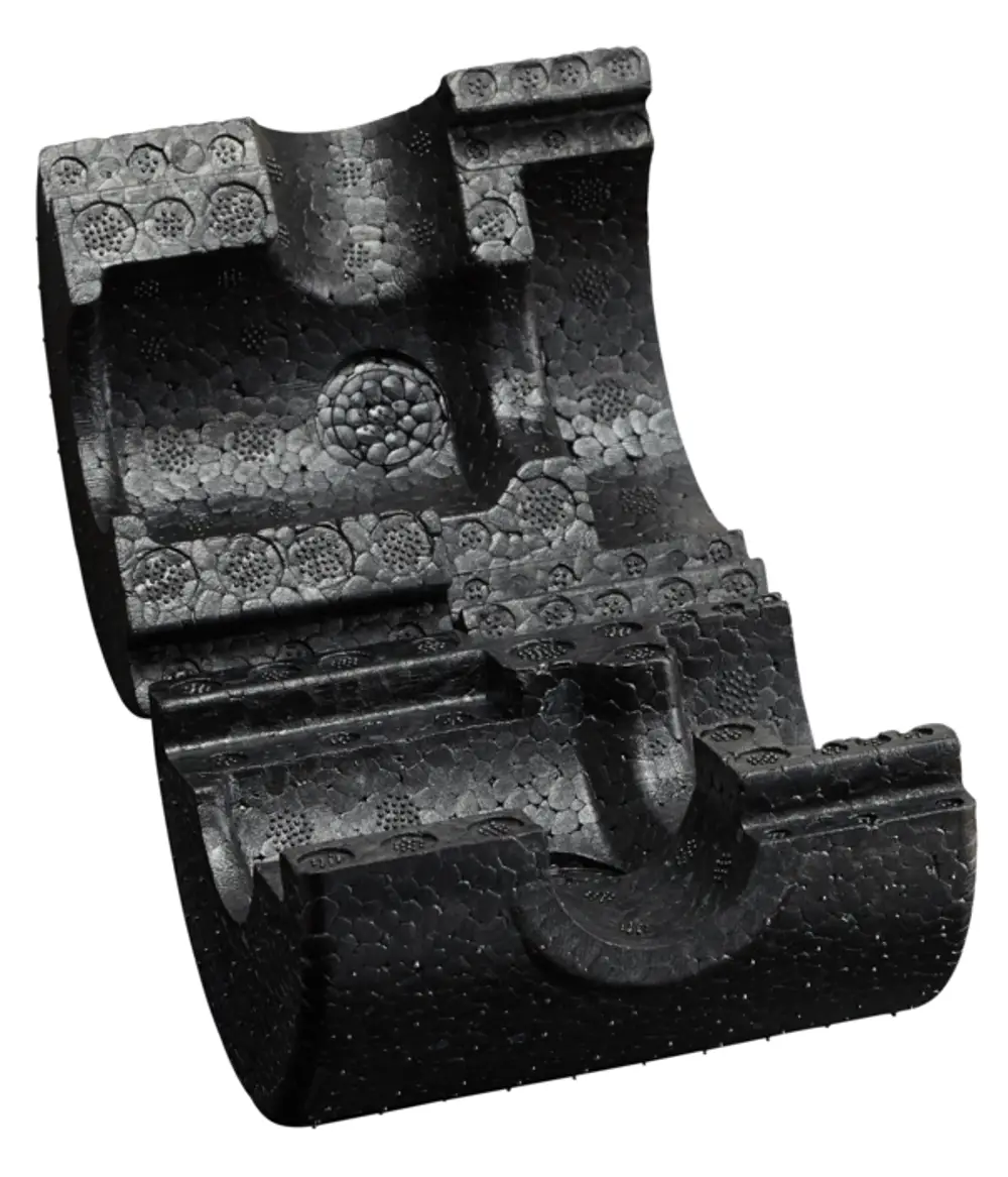 Wärmedämmeschale mit strukturiertem Design, passend für Pumpenkugelhähne, hergestellt von Oventrop. Die Oberfläche weist verschiedene haptische Muster auf.